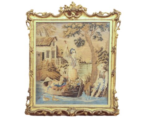 An early 19th century needlework panel in a good gilt and composition frame - the frame with foliate cresting and foliate and