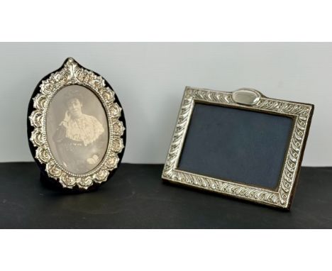 Two modern silver photo frames - Keyford Frames Ltd, London 1980 and 1986, the oval frame 16.5cm high, with easel backs.