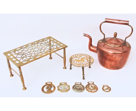 Eight pieces of copper and brass ware, comprising - 1. A large copper kettle with acorn finial, 32 cm high 2. A large Victori