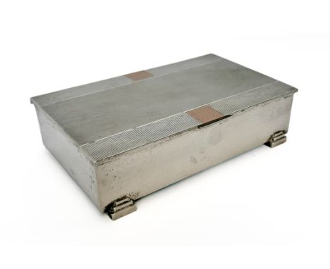 An Elizabeth II silver and rose gold Art Deco style cigarette box - Deakin &amp; Francis, Birmingham 1961, rectangular with s