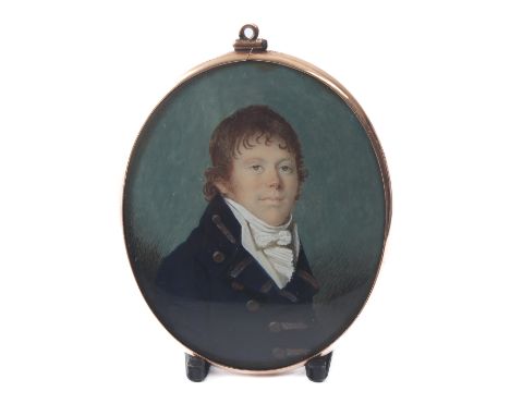 English School (early 19th century): a portrait miniature of a naval officer - painted on ivory, oval, wearing a blue greatco