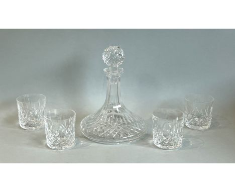 A Waterford Lismore pattern ship's decanter and a set of four matching whisky tumblers - all with etched factory marks, the d