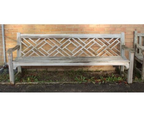 A long hardwood garden bench with latticework back (LWH 213 x 63 x 89 cm)