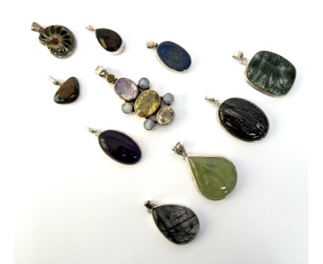 Ten mixed gemstone and fossil sterling large silver pendants - of a variety of forms, including examples set with Prehnite; L