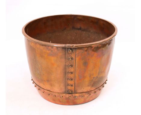 A large antique rivetted copper planter or log 'basket' - 56.5cm rim diameter, 42cm high.