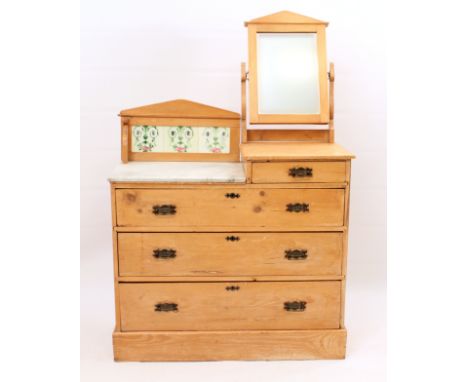 An Edwardian pine washstand-top chest of drawers - with a peak-top rectangular mirror over a short drawer to the right, a til