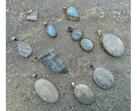 Ten sterling silver and Rainbow Moonstone pendants - of varying forms, all polished, the size ranging from 2cm to 6cm drop (p
