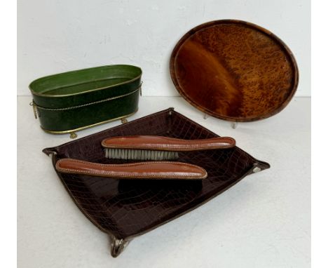 Five pieces, comprising - 1. A dark brown crocodile leather tray with poppered corners, 32.5 x 28cm 2. A small tole ware oblo