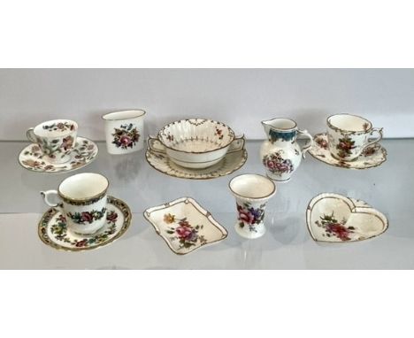 Nine pieces of bone china by Coalport, Royal Crown Derby, Royal Worcester and Minton - to include a small Royal Worcester mas