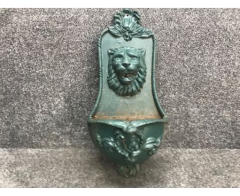 Large cast iron wall planter with lions head