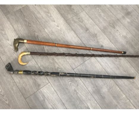 Carved buffalo horn walking stick with Egyptian handle together with blackthorn walking stick with sheep horn handle plus sec