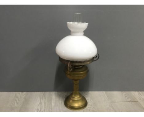 Vintage brass oil lamp complete with glass dome