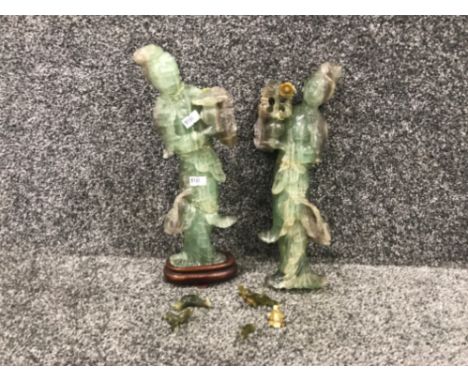 Pair of carved oriental jade like figurines of a man and woman damage repaired