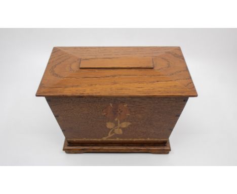 An Arthur Simpson of Kendal, Arts and Crafts oak and inlaid tea caddy. Attributed firmly to Arthur Simpson Of Kendal. This th