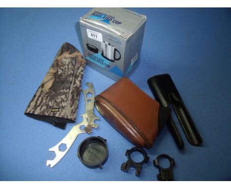 Selection of miscellaneous gun related items including leather forend cover, leather butt pad, tools, scope rings, insulated 