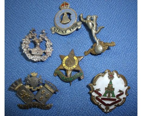 Group of lapel and other military badges including Strike True Fighters Squadron, Scottish Units, Royal Signals, Ypres badge,