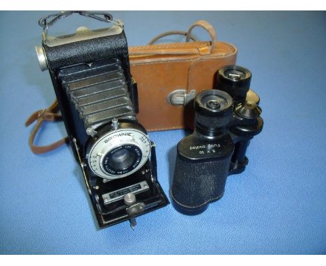 Cased vintage Kodak camera and a pair of No CT0VIST II 8x30 binoculars (2) 