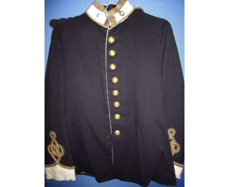 Pre 1914 Army Service Corps Officers dress tunic of blue cloth with white facings with braided detail, gilt buttons and ename