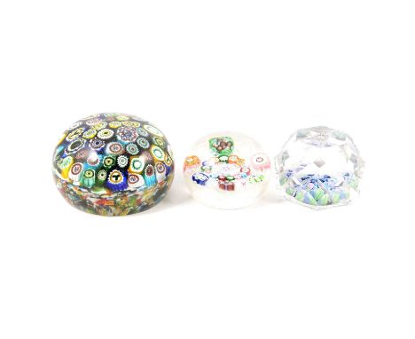 A Paul Ysart Harland millefiori glass paperweight, signed H within pink cane; a Whitefriars faceted millefiori glass paperwei