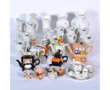 Twelve novelty miniature teapots, to include Portmeirion; nine Portmeirion Parian jugs, to include floral, grape and vine and