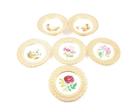 Two Minton comports, pierced and gilt borders, painted with classic landscapes with figures before ruins, a matching plate, a
