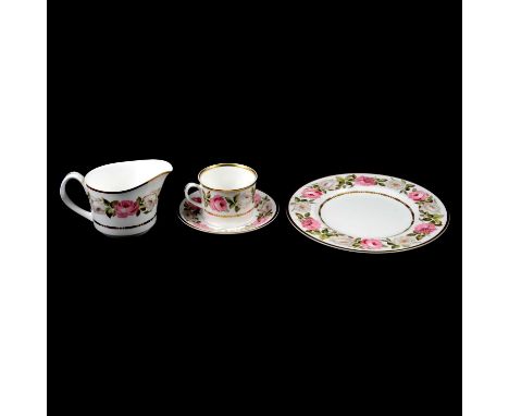 A Royal Worcester Royal Garden pattern part dinner and teaset, comprising dinner plates, side plates, cups, saucers, milk jug