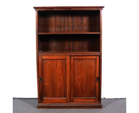 Victorian walnut bookcase, open upper section with an adjustable shelf, cupboard under with sliding door, plinth base, width 