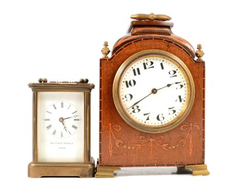 A brass carriage clock, rectangular emamelled dial marked Matthew Norman London, movement signed Matthew Norman AE London AE 