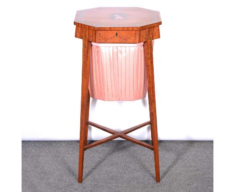 Edwardian painted satinwood work table, octagonal form, the lid painted with a portrait oval, satin lined basket under, taper