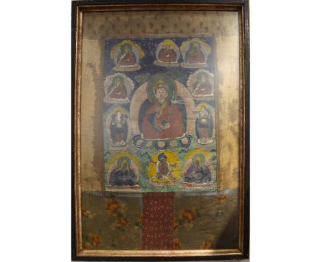 A Tibetan Thangka, the central panel painted on fabric with Tsongkhapa surrounded by ten other deities, printed fabric collea