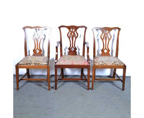 Set of eight mahogany dining chairs, of Chippendale design, gros point needlework drop-in seats, square tapering legs joiend 