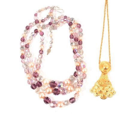 A Christian Dior three strand necklace, purple and blue faceted crystal spaced by simulated pearls, marked on tab Christian D