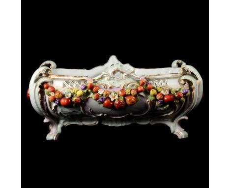 Continental porcelain centre bowl, rectangular form with pierced and floral encrusted sides, scrolled legs, 37cm, blue shield