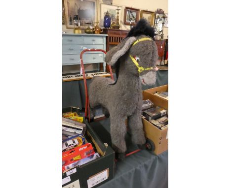 A Vintage Child's Ride on Donkey Toy 