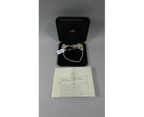 A Pearl Necklace Consisting of Three Strands and Two Clasps, Pink White 'C' Grade, with Insurance Valuation for £1925 