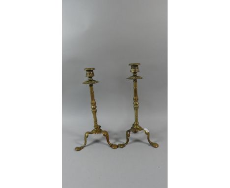 A Pair of 19th Century Brass Candle Sticks on Tripod Supports, 33cm High 