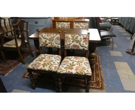 An Oak Rectangular Dining Table with Bulbous Supports Together with Four Matching Tapestry Upholstered Chairs 