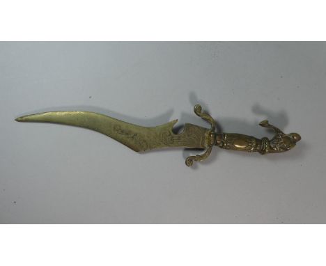 A Oriental Brass Dagger with Curved Blade and Leopard Mask Handle, Total Length 40cm 