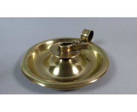 A Brass Bed Chamber Stick with Sprung Candle Grip, 17cm Diameter 