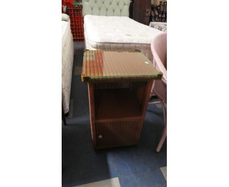 A Lloyd Loom Bedside Cupboard 