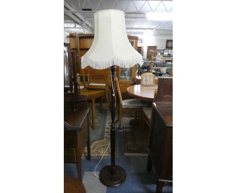 A Mid 20th Century Mahogany Standard Lamp 
