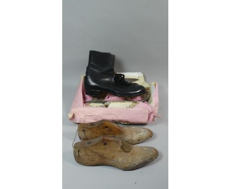 A Pair of Vintage Ladies Skating Boots and a Pair of Wooden Trees 