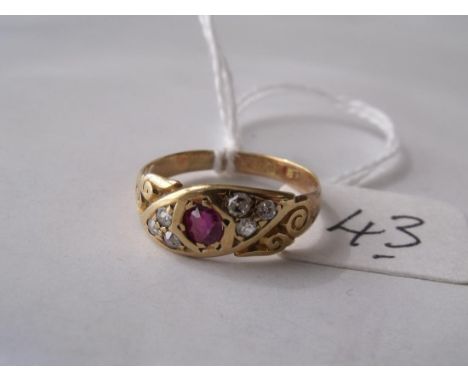 A small ruby & diamond gypsy ring     