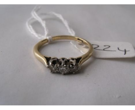 A three stone diamond ring in 18ct gold mount  approx size 'O'       