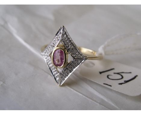 A pink sapphire & diamond lozenge ring   set in 9ct        