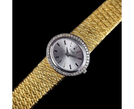 A fine Piaget 18ct gold and diamond set manual wind ladies bracelet wristwatch, 27mm, the bezel set with fifty 'eight' cut di