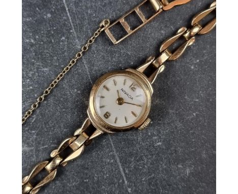 A Nivada 9ct gold manual wind ladies wristwatch, 15.5mm, Ref. 395339, on integrated 9ct gold pierced bracelet.