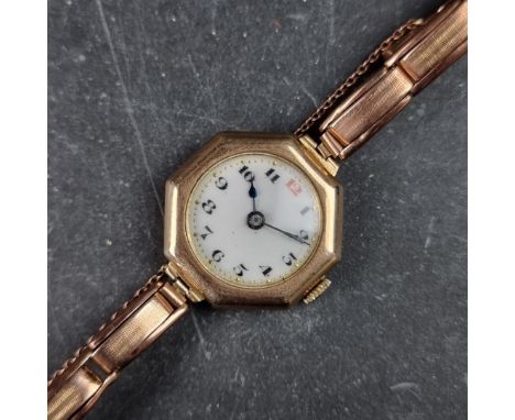 A 1920s 9ct gold manual wind ladies wristwatch, 25mm, Case Ref. 79742, having Swiss made movement, on integrated expanding 9c