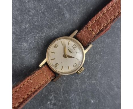 A circa 1960 Longines 9ct gold manual wind ladies wristwatch, 17mm, on contemporary brown leather strap.