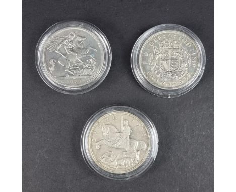 Coins: a George V 1935 'Rocking Horse' crown, together with two George VI crowns, 1937 and 1951. (3)